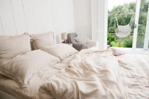 messy bed aesthetic cozy bedroom with layered linen bedding